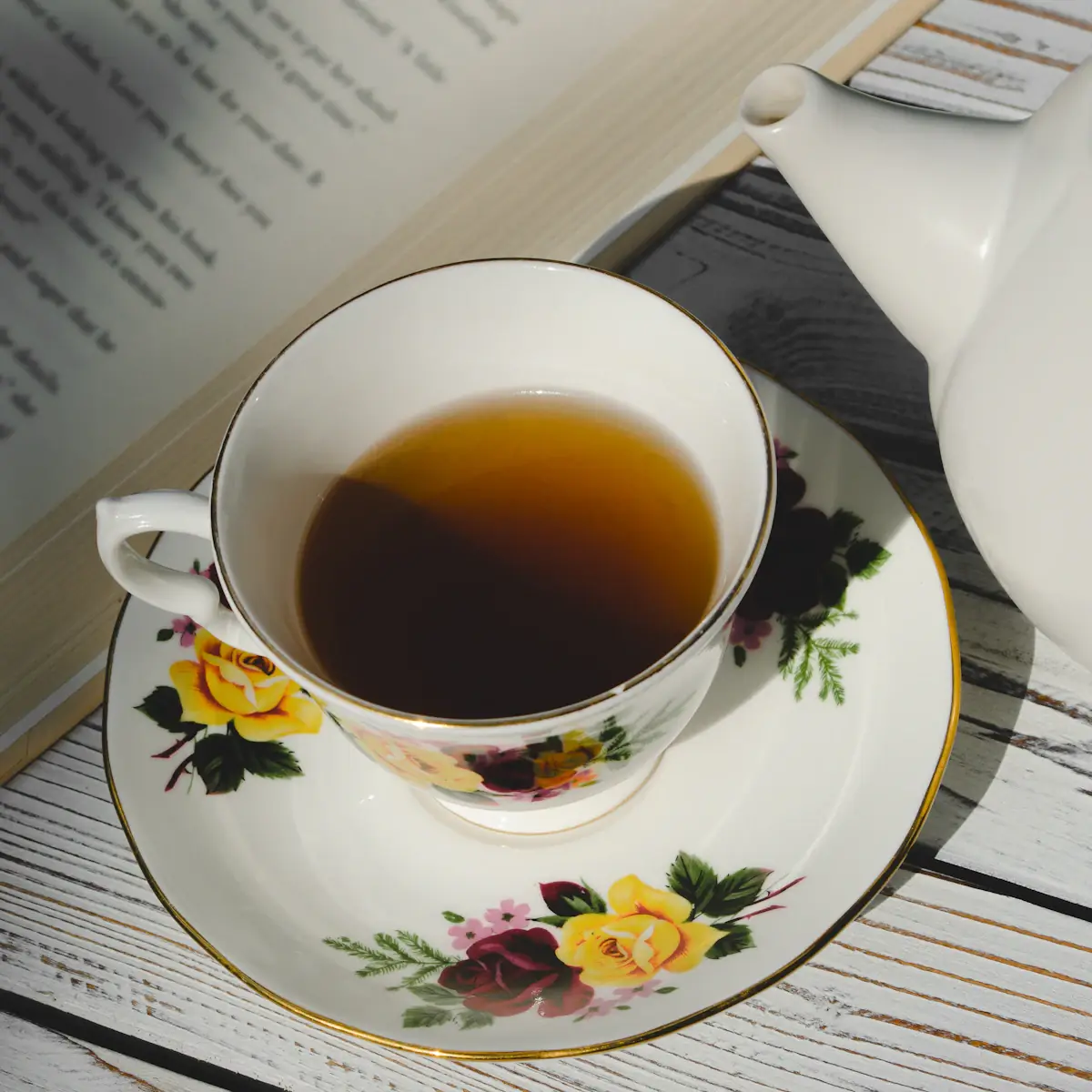 A floral china teacup of tea